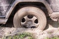 SUV got stuck in the mud, wheel closeup Royalty Free Stock Photo