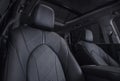 SUV interior with rows of leather seats at night. Royalty Free Stock Photo