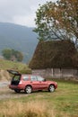 SUV on a mountain road Royalty Free Stock Photo