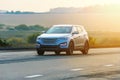 SUV moves on the country highway Royalty Free Stock Photo