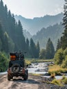 SUV moves down country road, next to river, ready for camping Royalty Free Stock Photo