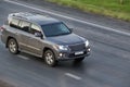 SUV moves on highway Royalty Free Stock Photo