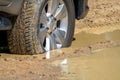 Suv 4wd car rides through muddy road Royalty Free Stock Photo