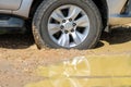 Suv 4wd car rides through muddy road Royalty Free Stock Photo