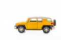 Suv yellow toy car toyota landcruiser Royalty Free Stock Photo