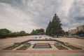 Suvorov square in Tiraspol with cemetery close to it and some trees with thick clouds on the sky