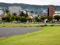 Rainy day at Suwa Lakeside Park with heavy clouds covering the mountains around Lake Suwako