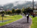 Rainy day at Suwa Lakeside Park with heavy clouds covering the mountains around Lake Suwako