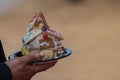 Man Holds Handmade Gingerbread House At Christmas Festival Contest