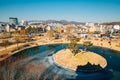 Suwon cityscape and frozen pond at winter in Korea