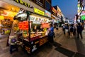 Suwon, South Korea. Adult man buying fast food at main street in Suwon. Street food is very popular in Korea