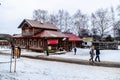 Suzdal, Russia - February 29, 2020 : Tourist watching folk singing and dance at Architecture and cultural-history museum, Maslen