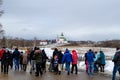 Suzdal, Russia - February 29, 2020 : Tourist watching folk singing and dance at Architecture and cultural-history museum, Maslen