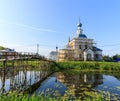 Suzdal, Russia. wooden bridge through the Kamenka River to Church of Epiphany and Nativity Cathedral of Suzdal Kremlin Royalty Free Stock Photo