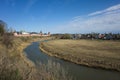 Suzdal view with river Kamenka, Saint Euthymius monastery red wall with towers, residential area and central Russia