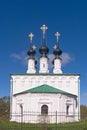 Church of the Entry into Jerusalem 1707 with black domes and crosses shining in the spring sun. Suzdal, Golden Ring of Russia