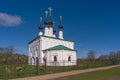 Church of the Entry into Jerusalem 1707 with black domes and crosses shining in the spring sun. Suzdal, Golden Ring of Russia