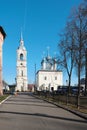 Suzdal, Vladimir region, Russia - Tourists board a bus in front of the entrance to the Smolensk Church in Suzdal.