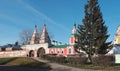 Suzdal, Vladimir region, Russia - Tourists in front of the entrance to the Rizopolozhensky Convent Royalty Free Stock Photo