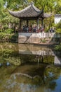 Canal reflects pavilion at Humble Administrators garden, Suzhou, China