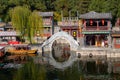 Suzhou market street with a boat and bridge on the river, at the Summer Palace