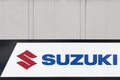 Suzuki logo on a wall