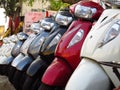 Suzuki Scooters for sale next to a Honda shop in India
