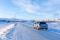 Suzuki swift car on a winter snowy road