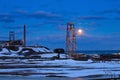 Svalbard - Longyearbyen - Moon behind coal mining posts