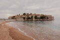 Sveti Stefan historical town island and paradise sand beach. Budva, Montenegro Royalty Free Stock Photo