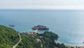 Sveti Stefan, view from the mountain. Montenegro, the Adriatic Sea, the Balkans. Island in the sea with hotel and town inside