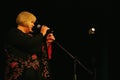 Svetlana Kryuchkova on the Estrada theatre stage singing and reading poetry.