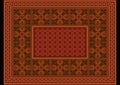 Terracotta carpet with ethnic ornaments and patterns of orange flowers on the border and a patterned field in the center