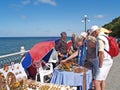 SVETLOGORSK, RUSSIA. The elderly woman buys an amber souvenir