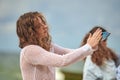 Female dance performance on sunny beach, sea waves background, woman dancer dancing outdoor