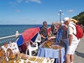 SVETLOGORSK, RUSSIA.Tourists buy an amber souvenir