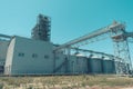 Svetlovodsk, Ukraine  Ã¢â¬â 27 May, 2018: Modern Agricultural Silos against blue sky. Storage and drying of grains, wheat, corn, soy Royalty Free Stock Photo