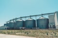 Svetlovodsk, Ukraine  27 May, 2018: Modern Agricultural Silos against blue sky. Storage and drying of grains, wheat, corn, soy Royalty Free Stock Photo