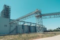 Svetlovodsk, Ukraine  Ã¢â¬â 27 May, 2018: Modern Agricultural Silos against blue sky. Storage and drying of grains, wheat, corn, soy Royalty Free Stock Photo