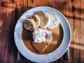 Svickova na smetane beef in sour cream sauce with whipped cream and cranberries served with knedlik bread dumpling