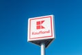 Kaufland logo on blue sky