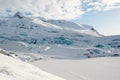 Svinafellsjokull glacier tongue in winter, blue icebergs covered by snow, Iceland Royalty Free Stock Photo