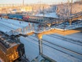 Svir, Russia,01.02.24: Svir railway station on the Oktyabrskaya railway. Passenger freight trains on rails. People and