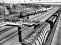 Svir, Russia,01.02.24: Svir railway station on the Oktyabrskaya railway. Passenger freight trains on rails. People and