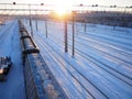 Svir, Russia,01.02.24: Svir railway station on the Oktyabrskaya railway. Passenger freight trains on rails. People and