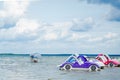 Svityaz- September 2019: colored old vintage plastic catamarans and boats near a wooden pier on the shore of a large lake Royalty Free Stock Photo