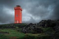 Svortuloft red lighthouse on the cliff in Iceland