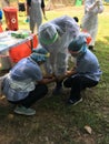 Medical team conduct COVID-19 coronavirus Rapid test PCR test ,cover in PPE suit, CDCU team Buriram province, Thailand
