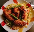 Swabian spaetzle with green beans and carrots and grilled chicken