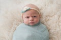 Swaddled Baby Girl with Cute Expression